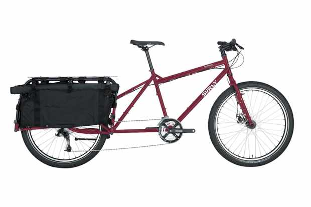 Load carrying bike reviews Dark red Surly Big Dummy bicycle with a load-carrying rack on the back, on a white background