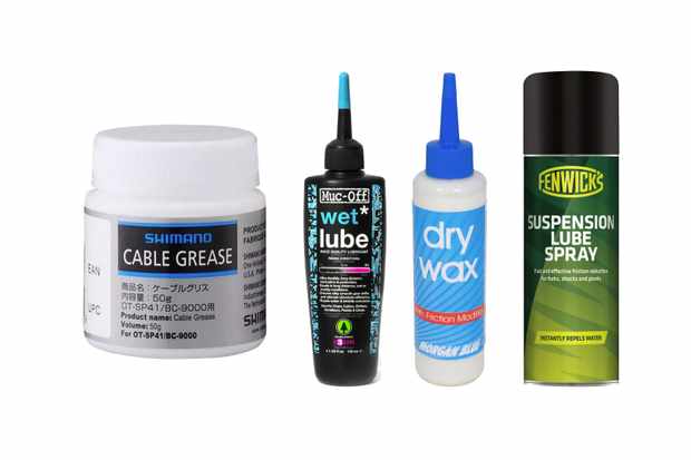 Bike oils and lubricant reviews Collage of 4 different containers of bike lubricant on a white background